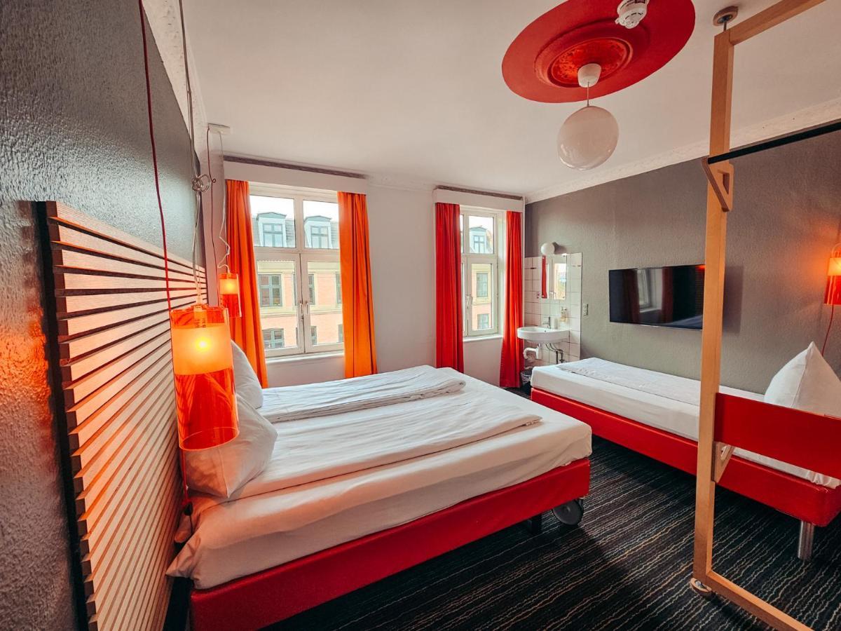 Dreibettzimmer mit Gemeinschaftsbad